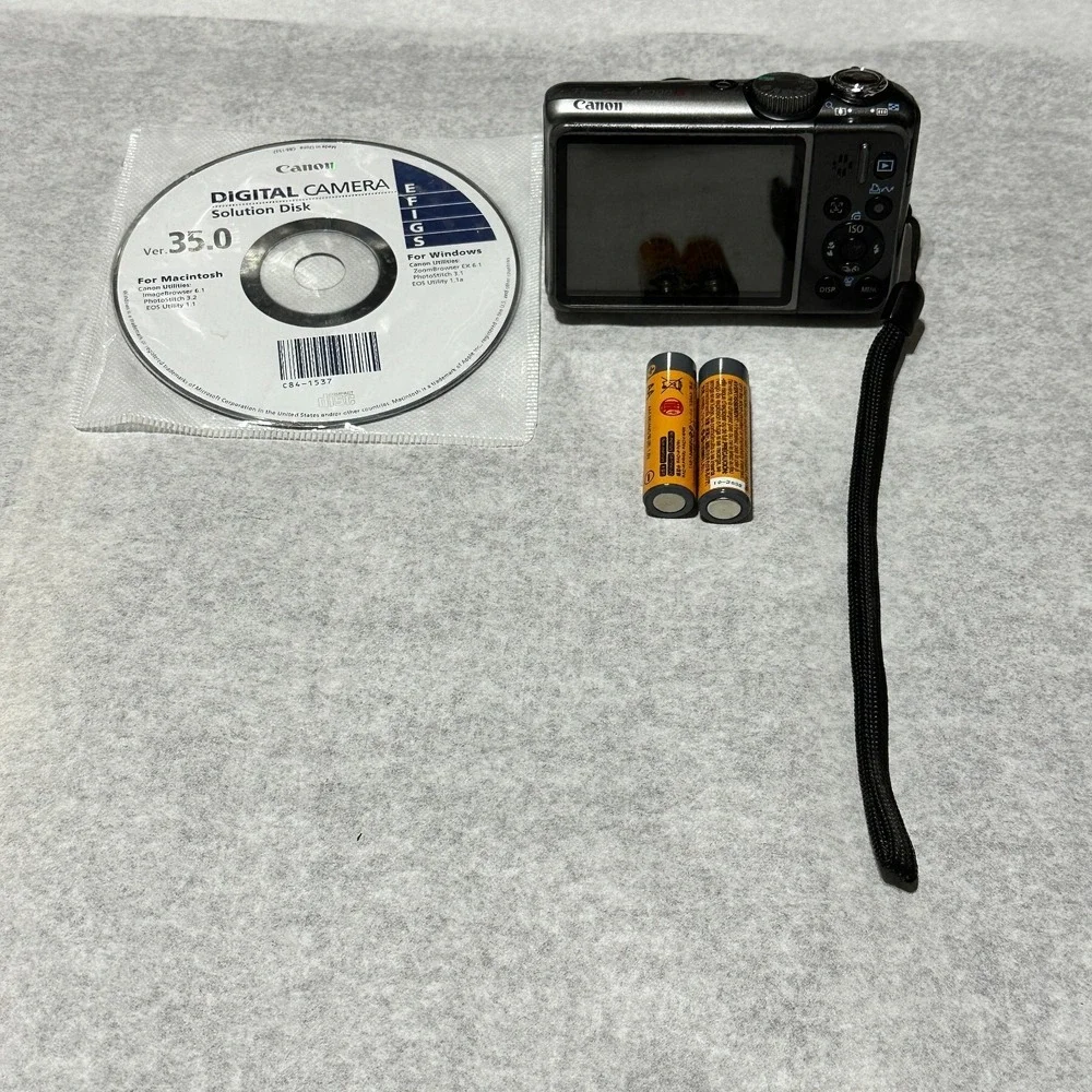 Canon PowerShot A2000 IS 10MP Digital Camera Pink For Parts Or Repair Lens Error